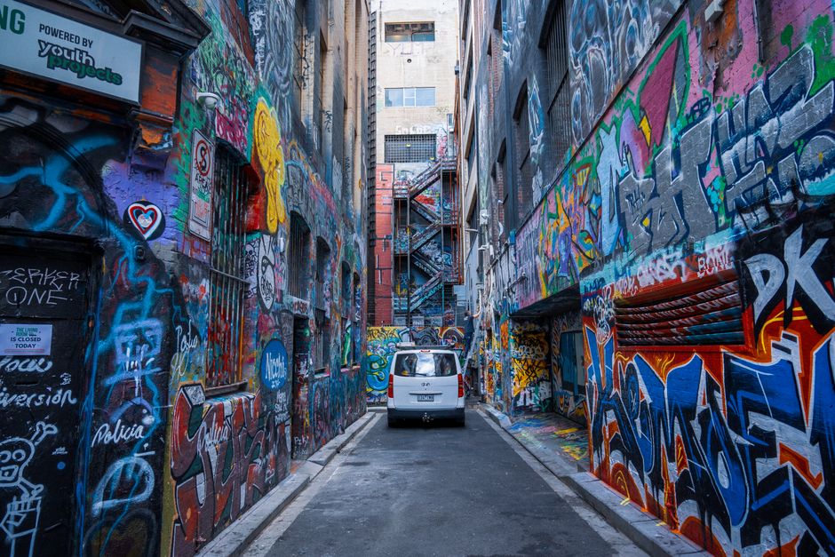 Vivid street art covering walls in Melbourne's iconic Hosier Lane.