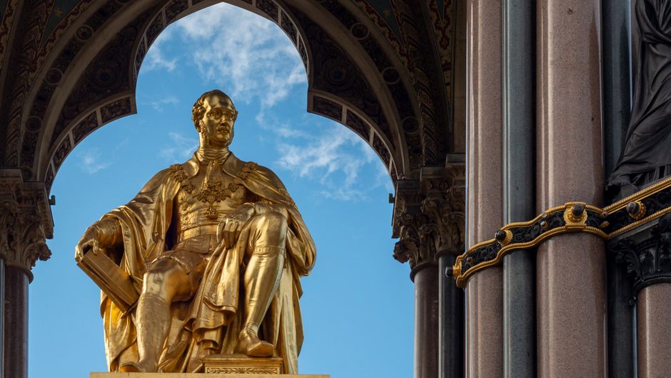 Close-up of the golden statue of Prince Albert at the Albert Memorial in Kensington Gardens, London.