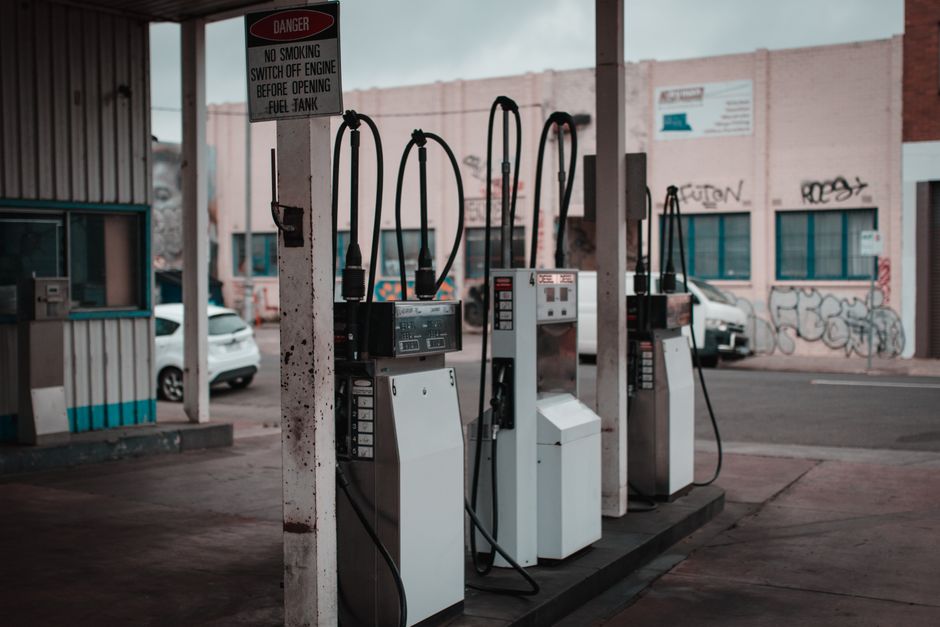 Empty gas station with visible graffiti in Collingwood, Australia.